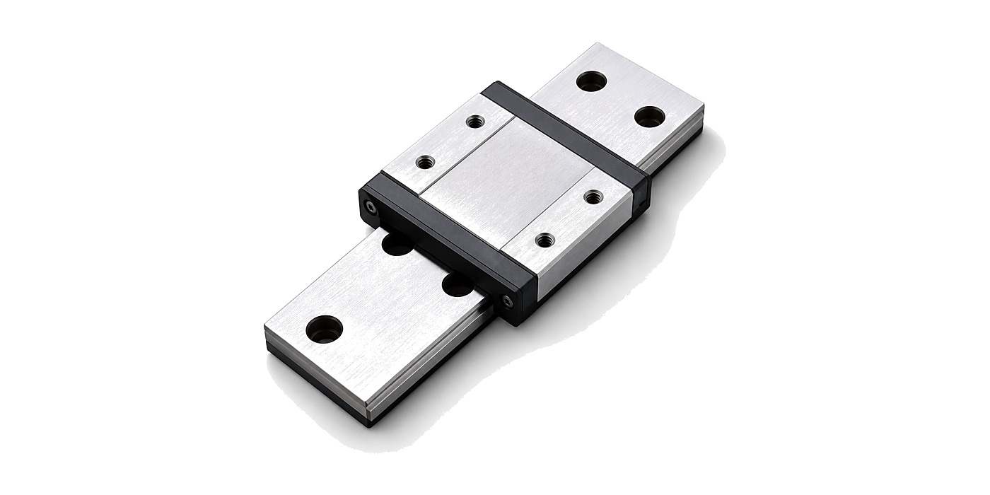 DDJ STW12 wide carriage — ground raceway surfaces and precision-machined body