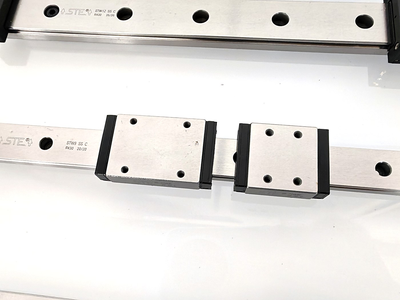 DDJ STW wide-type carriage next to a standard carriage — real product photo